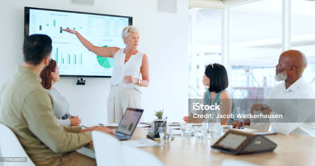 Business team discussing growth strategy and financial data