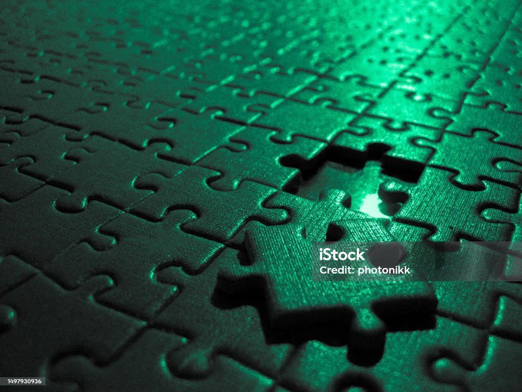 Green puzzle pieces fitting together